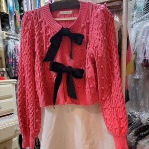 Alice and Olivia Pink Kitty sweater and black bows.   Small